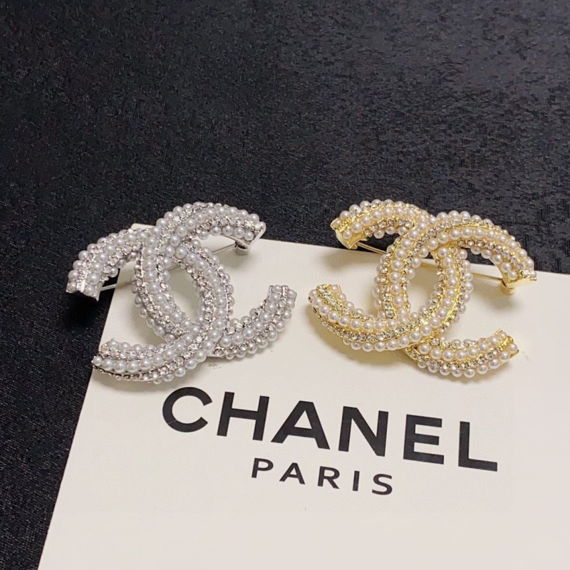 Ch*el brooches